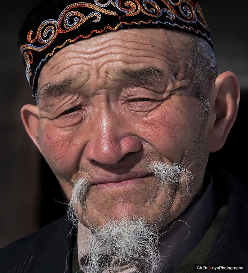 portrait of kazakh hunter in mongolia